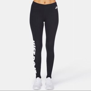 Black nike leggings with reflective letters